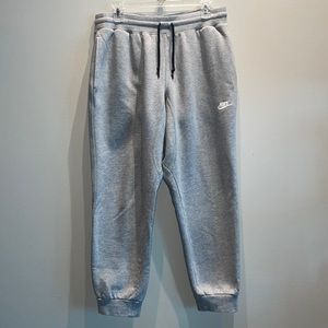 Nike gray sweatpants. Mens large. Drawstring ties. Length fits like medium.